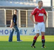15 August 2010; A spectator walks across the pitch before been removed by security. Platinum One Challenge, Shamrock Rovers v Manchester United Reserves, Tallaght Stadium, Tallaght, Dublin. Picture credit: David Maher / SPORTSFILE