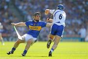 15 August 2010; Michael Walsh, Waterford, slips past Gearoid Ryan, Tipperary. GAA Hurling All-Ireland Senior Championship Semi-Final, Waterford v Tipperary, Croke Park, Dublin. Picture credit: Ray McManus / SPORTSFILE