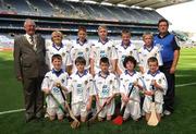 15 August 2010; President of the INTO Jim Higgins with the Waterford team, which included, Jack O’Connor, Scoil Chill Ruadhain, Glanmire, Co. Cork, John Mullins, Scoil Eoin Baiste S.N.S., Clontarf, Co. Dublin, Ronan Hayes, St. Patrick’s B.N.S., Blackrock, Co. Dublin, Jack Murphy, Clarecastle N.S., Co. Clare, Conor O’Brien, Watergrasshill N.S., Co. Cork, Gearóid Downey, Scoil Íde Naofa, Raheenagh, Co. Limerick, Brian McPartland, C.B.S., Doon, Co. Limerick, Lorcan McCaughey, St. Joseph’s P.S., Carryduff, Co. Down, Eoin Savage, St. Mary’s P.S., Portaferry, Co. Down and Eoin Coulter, St. Patrick’s, Ballygalget, Co. Down. GAA Into Mini-Sevens during half time of the GAA Hurling All-Ireland Senior Championship Semi-Final, Waterford v Tipperary, Croke Park, Dublin. Picture credit: Ray McManus / SPORTSFILE