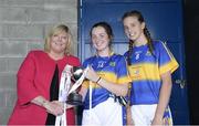 2 July 2016; President of the Ladies Gaelic Football Marie Hickey presents the cup to joint captain's Ciara Dwan and Caitlin Kennedy of Tipperary after the All-Ireland Ladies Football U14 'B' Championship Final at McDonagh Park in Nenagh, Co Tipperary. Photo by Ray Lohan/SPORTSFILE