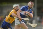 2 July 2016; Ryan Mullaney of Laois in action against Aron Shanagher of Clare during the GAA Hurling All-Ireland Senior Championship Round 1 match between Clare and Laois at Cusack Park in Ennis, Co Clare. Photo by Stephen McCarthy/Sportsfile
