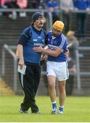 2 July 2016; Laois manager Séamas Plunkett comforts Charles Dwyer after he was sent off late in the GAA Hurling All-Ireland Senior Championship Round 1 match between Clare and Laois at Cusack Park in Ennis, Co Clare. Photo by Piaras Ó Mídheach/Sportsfile