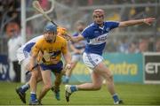 2 July 2016; Shane O'Donnell of Clare in action against Enda Rowland and Ryan Mullaney of Laois, right, during the GAA Hurling All-Ireland Senior Championship Round 1 match between Clare and Laois at Cusack Park in Ennis, Co Clare. Photo by Piaras Ó Mídheach/Sportsfile