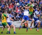 2 July 2016; Martin McElhinney of Donegal in action against Conor McCarthy, left, and Karl O'Connell of Monaghan during the Ulster GAA Football Senior Championship Semi-Final Replay between Donegal and Monaghan at Kingspan Breffni Park in Cavan. Photo by Stephen McCarthy/Sportsfile
