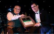 2 July 2016; Oliver Murphy from Drogheda, Co. Louth, pictured receiving the Paralympian Recognition award from President of Paralympics Ireland, James Gradwell, at the Paralympics Ireland More Than Sport fundraising ball. The event was held in order to raise vital funds for the Irish team on the road to Rio 2016 at the Ballsbridge Hotel in Dublin. Photo by Sportsfile