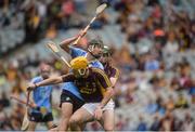 3 July 2016; Ronan Hayes of Dublin in action against Darren Byrne and Garry Molloy of Wexford, behind, during the Electric Ireland Leinster GAA Hurling Minor Championship Final match between Dublin and Wexford at Croke Park in Dublin. Photo by Piaras Ó Mídheach/Sportsfile