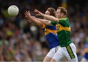 3 July 2016; Darran O’Sullivan of Kerry competes for the ball with Bill Maher of Tipperary during the Munster GAA Football Senior Championship Final match between Kerry and Tipperary at Fitzgerald Stadium in Killarney, Co Kerry. Photo by Brendan Moran/Sportsfile