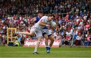 3 July 2016; Colm Cavanagh of Tyrone is tackled by Conor Moynagh of Cavan during the Ulster GAA Football Senior Championship Semi-Final Replay between Tyrone and Cavan at St Tiemach's Park in Clones, Co Monaghan. Photo by Ramsey Cardy/Sportsfile