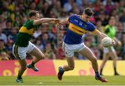 3 July 2016; Michael Quinlivan of Tipperary in action against Mark Griffin of Kerry during the Munster GAA Football Senior Championship Final match between Kerry and Tipperary at Fitzgerald Stadium in Killarney, Co Kerry. Photo by Brendan Moran/Sportsfile