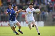 3 July 2016; Rory Brennan of Tyrone is tackled by Jason McLoughlin of Cavan during the Ulster GAA Football Senior Championship Semi-Final Replay between Tyrone and Cavan at St Tiemach's Park in Clones, Co Monaghan. Photo by Ramsey Cardy/Sportsfile