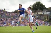 3 July 2016; Sean Cavanagh of Tyrone in action against Dara McVeety of Cavan during the Ulster GAA Football Senior Championship Semi-Final Replay between Tyrone and Cavan at St Tiemach's Park in Clones, Co Monaghan. Photo by Ramsey Cardy/Sportsfile