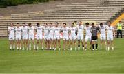 3 July 2016; The Tyrone players stand for the National Anthem at the Ulster GAA Football Senior Championship Semi-Final Replay between Tyrone and Cavan at St Tiemach's Park in Clones, Co Monaghan. Photo by Philip Fitzpatrick/Sportsfile