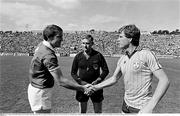 28 August 1983; Dublin captain Tommy Drumm, right, shakes hands with Cork captain Christy Ryan, while referee PJ McGrath looks on. All-Ireland Senior Football Championship Semi-Final Replay, Dublin v Cork, Páirc Uí Chaoimh, Cork. Picture credit: Ray McManus / SPORTSFILE