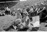 28 August 1983; Two young Cork supporters watch on from the sideline during the game. All-Ireland Senior Football Championship Semi-Final Replay, Dublin v Cork, Páirc Uí Chaoimh, Cork. Picture credit: Ray McManus / SPORTSFILE