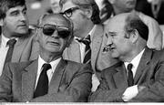 28 August 1983; Former Taoiseach Jack Lynch in conversation with Barry Desmond, T.D., Miniser for Social Welfare and Health at the game. All-Ireland Senior Football Championship Semi-Final Replay, Dublin v Cork, Páirc Uí Chaoimh, Cork. Picture credit: Ray McManus / SPORTSFILE