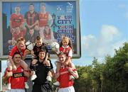 18 August 2010; David McGill, Shelbourne, left, Ken Oman, Bohemians, and Ian Birmingham, St. Patrick's Athletic, right, with from left, Karl Kelly, age 11, from Swords, Jack Burke, age 7, from Stoneybatter, and Jessica Tougher, age 7, from Clondalkin, at the launch of the Dublin City Council European City of Sport billboard campaign to promote Airtricity League football in the city. Malahide Road, Dublin. Picture credit: Brian Lawless / SPORTSFILE