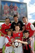 18 August 2010; David McGill, Shelbourne, left, Ken Oman, Bohemians, and Ian Birmingham, St. Patrick's Athletic, right, with from left, Jessica Tougher, age 7, from Clondalkin, Karl Kelly, age 11, from Swords, and Jack Burke, age 7, from Stoneybatter, at the launch of the Dublin City Council European City of Sport billboard campaign to promote Airtricity League football in the city. Malahide Road, Dublin. Picture credit: Brian Lawless / SPORTSFILE