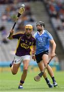 3 July 2016; Barry O'Connor of Wexford in action against Donal Burke of Dublin during the Electric Ireland Leinster GAA Hurling Minor Championship Final match between Dublin and Wexford at Croke Park in Dublin. Photo by Stephen McCarthy/Sportsfile