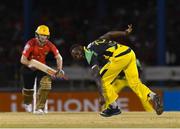 4 July 2016; Kesrick Williams, right, of Jamaica Tallawahs attempts to stop Colin Munro of Trinbago Knight Riders from scoring during Match 7 of the Hero Caribbean Premier League between Trinbago Knight Riders and Jamaica Tallawahs at Queen's Park Oval, in Port of Spain, Trinidad. Photo by Randy Brooks/Sportsfile