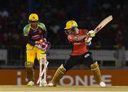 4 July 2016; Brendon McCullum, right, of Trinbago Knight Riders, is bowled out by a delivery from Imad Wasim of Jamaica Tallawahs, as keeper Kumar Sangakkara of Jamaica Tallawahs looks on during Match 7 of the Hero Caribbean Premier League between Trinbago Knight Riders and Jamaica Tallawahs at Queen's Park Oval, in Port of Spain, Trinidad. Photo by Randy Brooks/Sportsfile