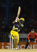 4 July 2016; Chris Gayle of Jamaica Tallawahs hits a 4 during Match 7 of the Hero Caribbean Premier League between Trinbago Knight Riders and Jamaica Tallawahs at Queen's Park Oval, in Port of Spain, Trinidad. Photo by Randy Brooks/Sportsfile