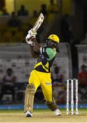 4 July 2016; Chris Gayle of Jamaica Tallawahs hits a 6 during Match 7 of the Hero Caribbean Premier League between Trinbago Knight Riders and Jamaica Tallawahs at Queen's Park Oval, in Port of Spain, Trinidad. Photo by Randy Brooks/Sportsfile