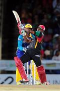 5 July 2016; Patriots batsman Evin Lewis pulls the ball for four during Match 8 of the Hero Caribbean Premier League between St Kitts & Nevis Patriots and Barbados Tridents at Warner Park in Basseterre, St Kitts. Photo by Ashley Allen/Sportsfile