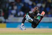 5 July 2016; Patriots wicket keeper Devon Thomas dives as he attempts to catch Steven Taylor during Match 8 of the Hero Caribbean Premier League between St Kitts & Nevis Patriots and Barbados Tridents at Warner Park in Basseterre, St Kitts. Photo by Ashley Allen/Sportsfile