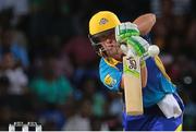 5 July 2016; AB De Villiers hits the ball down the ground during Match 8 of the Hero Caribbean Premier League between St Kitts & Nevis Patriots and Barbados Tridents at Warner Park in Basseterre, St Kitts. Photo by Ashley Allen/Sportsfile