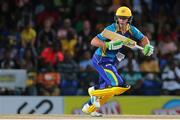 5 July 2016; Tridents' AB De Villiers turns for a second run during Match 8 of the Hero Caribbean Premier League between St Kitts & Nevis Patriots and Barbados Tridents at Warner Park in Basseterre, St Kitts. Photo by Ashley Allen/Sportsfile