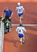15 August 2010; Waterford captain Stephen Molumphy, 11, leads team-mate Noel Connors, 4, and the rest of his team out before the game. GAA Hurling All-Ireland Senior Championship Semi-Final, Waterford v Tipperary, Croke Park, Dublin. Picture credit: Brendan Moran / SPORTSFILE