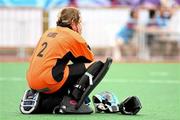 20 August 2010; Ireland goalkeeper Jenna Holmes kneels down in defeat at the final whistle of their girls' preliminary hockey match with Korea. Ireland were defeated 3-2. 2010 Youth Olympic Games, Seng Kang Hockey Stadium, Singapore.