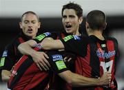 20 August 2010; Paul Keegan, Bohemians, head down, is congratulated by team-mates Gareth McGlynn and Conor Powell after scroing his side's second goal. Airtricity League Premier Division, Dundalk v Bohemians Oriel Park, Dundalk, Co. Louth. Picture credit: Oliver McVeigh / SPORTSFILE