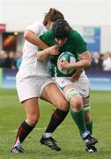 20 August 2010; Kate O'Loughlin, Ireland, is tackled by Amy Garnett, England. 2010 Women's Rugby World Cup - Pool B, England v Ireland, Surrey Sports Park, Guildford, England. Picture credit: Matt Impey / SPORTSFILE