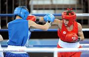 21 August 2010; Ryan Burnett, Ireland, right, in action against Vadzim Kirylenka, Belarus, during their light fly-weight 48 Kg boxing preliminary match. Burnett won 12-0. 2010 Youth Olympic Games, International Convention Centre, Singapore. Picture credit: James Veale / SPORTSFILE