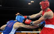 21 August 2010; Joe Ward, Ireland, right, exchanges punches with Damien Hooper, Australia, during their 75 Kg boxing preliminary match. Ward was defeated 4-2. 2010 Youth Olympic Games, International Convention Centre, Singapore.