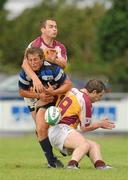 21 August 2010; Andy Brace, Old Crescent, is tackled by Stephen Shine, left, and Brian Cahill, Bruff. Mens Senior Plate Final, 2010 Meteor Munster Rugby Sevens, Garryowen Rugby Club, Dooradoyle, Limerick. Picture credit: Diarmuid Greene / SPORTSFILE