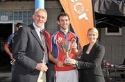 21 August 2010; The UL Bohemians captain Ed Torrie is presented with the cup by Denis Kelliher, Munster Rugby Vice President, and Amanda Carroll, Head of Meteor PR. Mens Senior Final, 2010 Meteor Munster Rugby Sevens, Garryowen Rugby Club, Dooradoyle, Limerick. Picture credit: Diarmuid Greene / SPORTSFILE