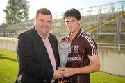 21 August 2010; John Mullins, CEO, Bord Gais, presents the man of the match award to Galway's Gerard Kelly after the game. Bord Gais Energy GAA Hurling Under 21 All-Ireland Championship Semi-Final, Galway v Dublin, O'Connor Park, Tullamore, Co. Offaly. Picture credit: Ray McManus / SPORTSFILE
