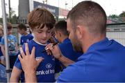 6 July 2016; Leinster rugby player Fergus McFadden signs an autograph for Carter Colm, aged 8, from Donnybrook, during the Bank of Ireland Leinster Rugby Camp at Donnybrook Stadium, Donnybrook, Dublin. Photo by Piaras Ó Mídheach/Sportsfile