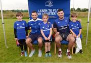 6 July 2016; Leinster rugby players Dave Kearney, left, and Mick Kearney pose for a photograph with, from left, Daniel Cumiskey, Tara Hickey and Sam Jackson, all age 8 and from Balbriggan during the Bank of Ireland Leinster Rugby Camp at Balbriggan RFC in Balbriggan, Co Dublin. Photo by Piaras Ó Mídheach/Sportsfile