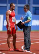 6 July 2016; Kevin Moore of Malta speaks to an official after being disqualified from his heat of the Men's 100m qualifying round on day one of the 23rd European Athletics Championships at the Olympic Stadium in Amsterdam, Netherlands. Photo by Brendan Moran/Sportsfile