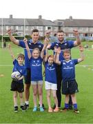 6 July 2016; Leinster rugby players Noel Reid, left, and Fergus McFadden pose for a photograph with participants, from left, Colm O'Donovan, aged 7, from Donnybrook, Ríodhna McGrath and Becky McGrath, both age 9 from Donnybrook, and Sean Rooney, age 7, from Ranelagh, at the Bank of Ireland Leinster Rugby Camp at Donnybrook Stadium, Donnybrook, Dublin. Photo by Piaras Ó Mídheach/Sportsfile