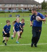 6 July 2016; Leinster rugby player Fergus McFadden with participants, from left, Sean Rooney, age 7 from Ranelagh, Ríodhna McGrath, aged 9, from Donnybrook and Colm O'Donovan, aged 7, from Donnybrook, during the Bank of Ireland Leinster Rugby Camp at Donnybrook Stadium, Donnybrook, Dublin. Photo by Piaras Ó Mídheach/Sportsfile