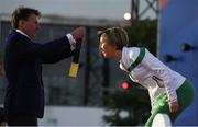 6 July 2016; Olive Loughnane of Ireland is presented with her gold medal for the Women's 20km Walk from the 2009 IAAF World Championships in Berlin by Lord Coe, President of the IAAF, during a victory ceremony on day one of the 23rd European Athletics Championships at the Olympic Stadium in Amsterdam, Netherlands. Photo by Brendan Moran/Sportsfile