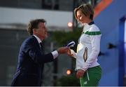 6 July 2016; IAAF President Lord Coe hands a flag of her local athletics club, Loughrea AC, to Olive Loughnane of Ireland after presenting her with her gold medal for the Women's 20km Walk from the 2009 IAAF World Championships in Berlin by Lord Coe, President of the IAAF, during a victory ceremony on day one of the 23rd European Athletics Championships at the Olympic Stadium in Amsterdam, Netherlands. Photo by Brendan Moran/Sportsfile