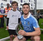 6 July 2016; Man of the match Sean Treacy of Dublin is presented with his trophy by seven year old Se Povey, from Dublin, at the Bord Gáis Energy Leinster GAA Hurling U21 Championship Final match between Offaly and Dublin at O'Connor Park in Tullamore, Co Offaly. Photo by David Maher/Sportsfile