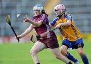 22 August 2010; Ailish O'Reilly, Galway, in action against Niamh Corry, Clare. All-Ireland Minor A Camogie Championship Final, Galway v Clare, Semple Stadium, Thurles, Co. Tipperary. Picture credit: Matt Browne / SPORTSFILE