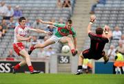 22 August 2010; Cillian O'Connor, Mayo, shoots past the Tyrone goalkeeper Mark McReynolds, and full-back Conor Clarke, only to see his shot sail wide of the posts. ESB GAA Football All-Ireland Minor Championship Semi-Final, Mayo v Tyrone, Croke Park, Dublin. Picture credit: Ray McManus / SPORTSFILE