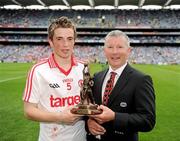 22 August 2010; Tyrone corner-forward Ronan Ó Néill is presented with the Man of the Match by James McHugh, ESB Representative, after the game. ESB GAA Football All-Ireland Minor Championship Semi-Final, Mayo v Tyrone, Croke Park, Dublin. Picture credit: Ray McManus / SPORTSFILE